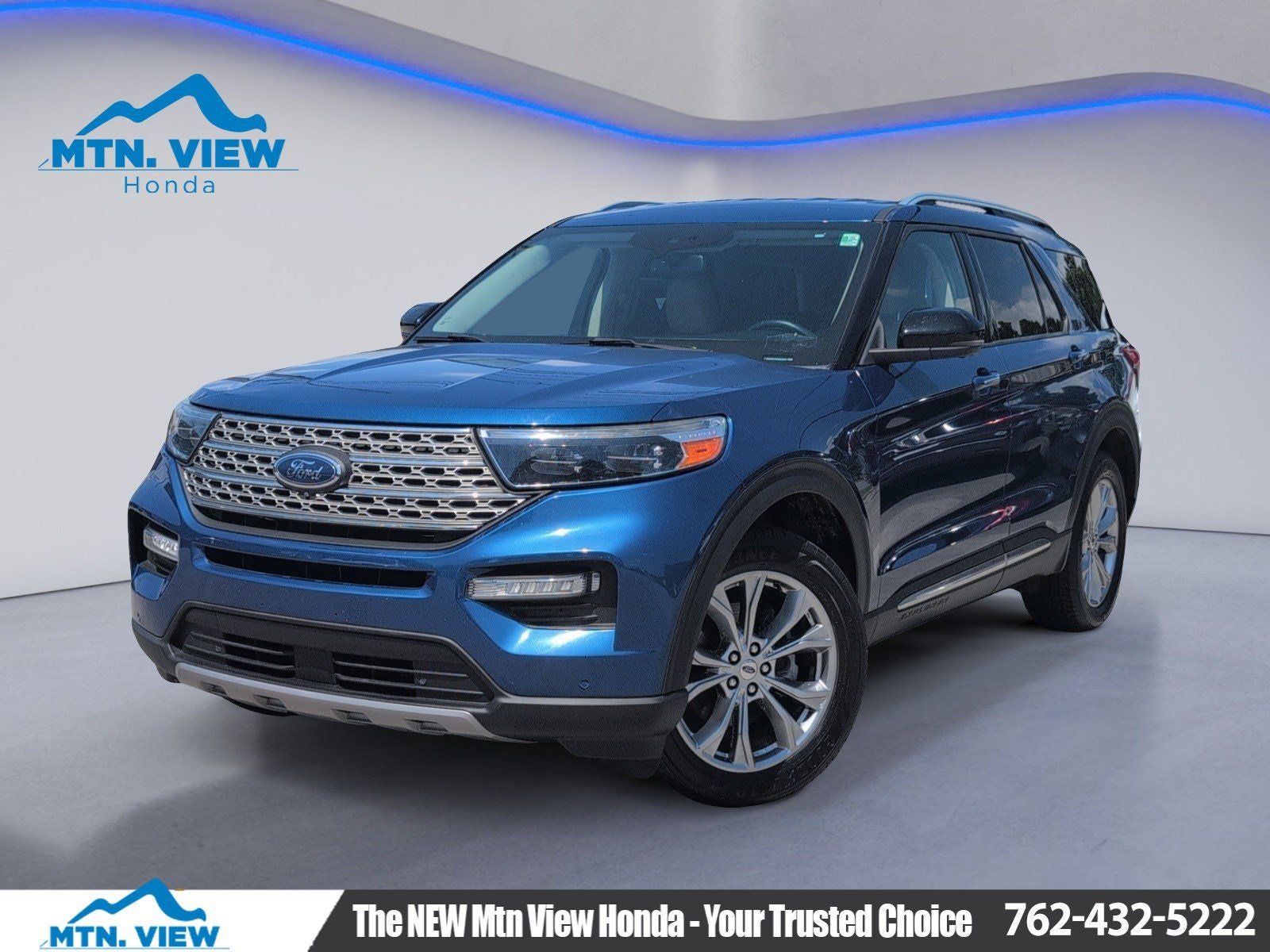 2021 Ford Explorer Limited in Blue Metallic — front three-quarter view