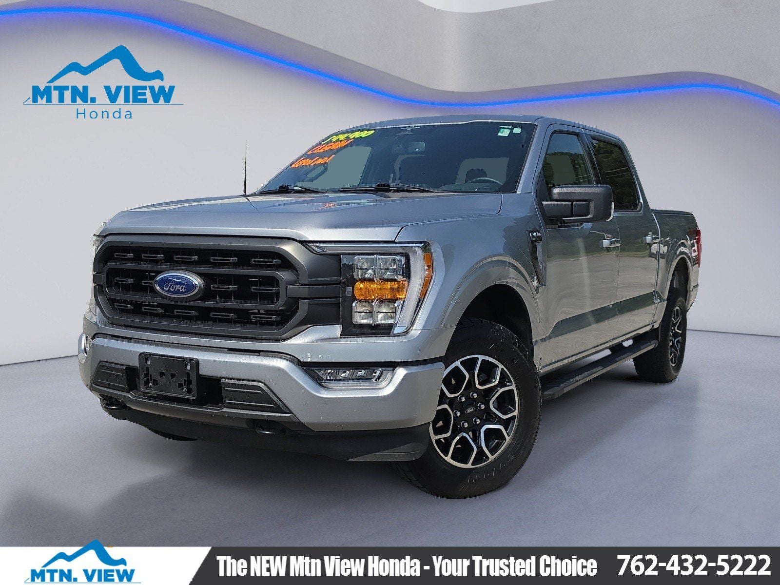 2023 Ford F-150 XLT in Silver Metallic — front three-quarter view