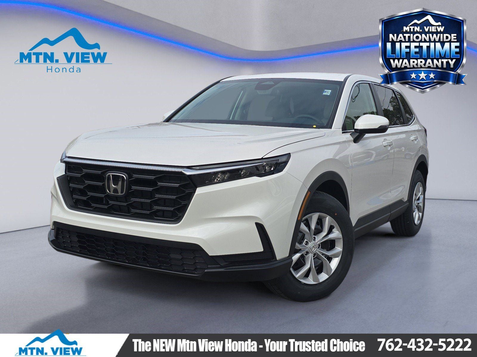 2026 Honda CR-V LX in Platinum White Pearl — front three-quarter view