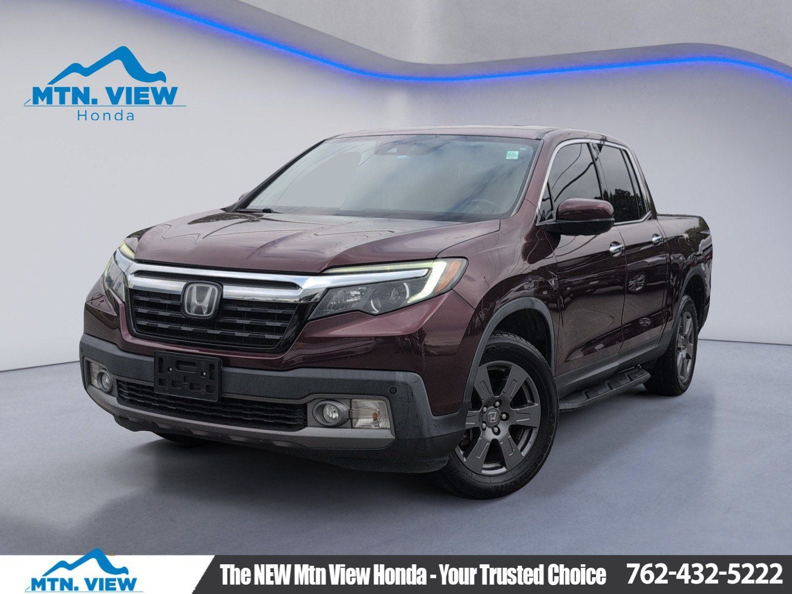2020 Honda Ridgeline RTL-E in Deep Scarlet Pearl — front three-quarter view