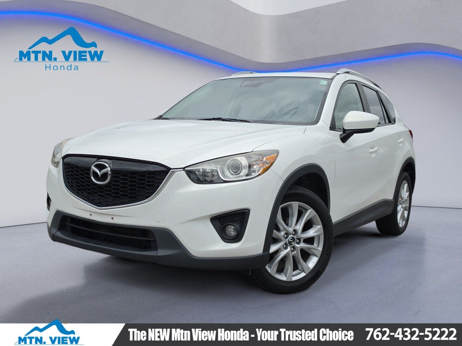 2015 Mazda Mazda CX-5 Grand Touring in Crystal White Pearl Mica — front three-quarter view